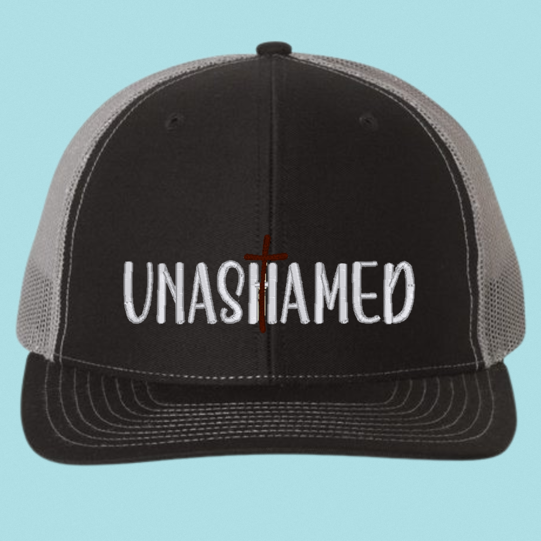 Unashamed Christian Trucker Hat – Embroidered Faith-Based Cap | Romans 1:16 Inspirational Mesh Hat (Black, Grey, or Pink)