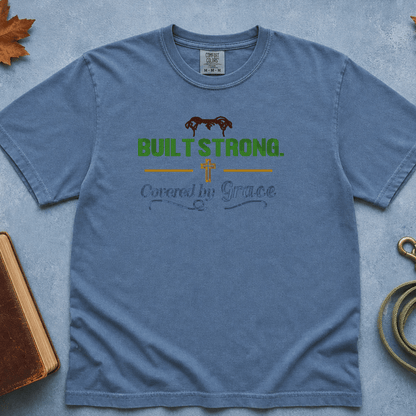 Built Strong Covered by Grace Comfort Colors Tee in Blue Jean flatlay with autumn leaves and dog leash