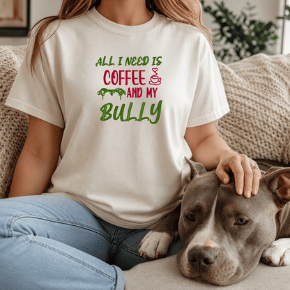 Woman wearing All I Need Is Coffee and My Bully tee in Ivory with bully breed dog