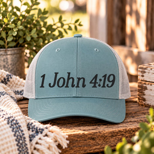 1 John 4:19 Hat
